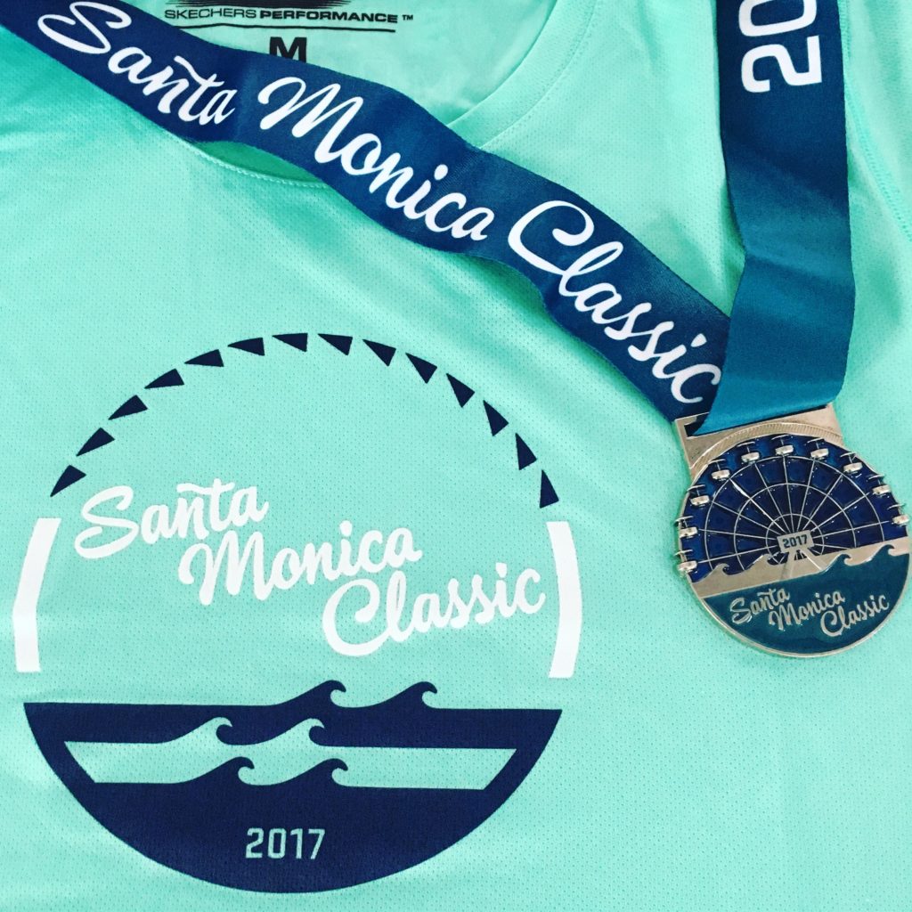 The shirt and medal from the Santa Monica Classic 2017